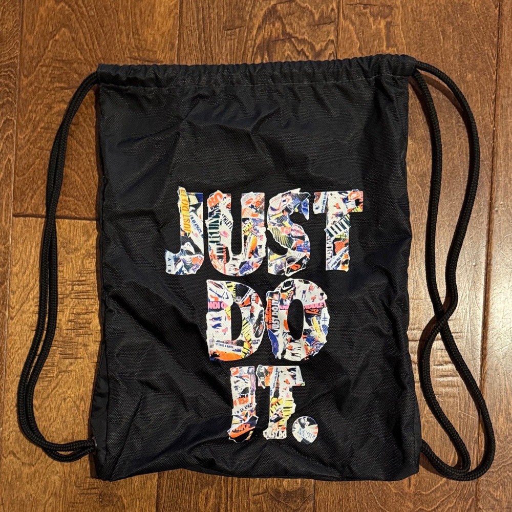 Nike Black Drawstring Bag with Multicolor 'JUST DO IT.' Graphic
